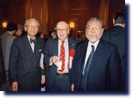 Photo of Mr.Gibney and two people at ceremony