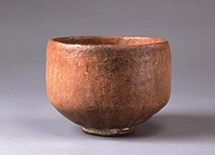 Photo of Red Raku tea bowl named Muichibutsu