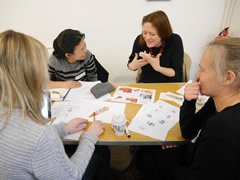 Image of members enjoying discussion at JTS training