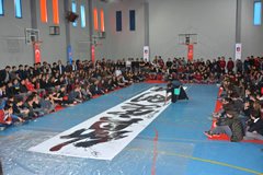 Picture of calligraphy performance at Atayurt Secondary School 