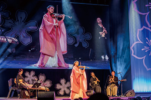 Photo of a concert featuring Ikuko Kawai Ensemble and traditional Japanese instruments at the National Cherry Blossom Festival