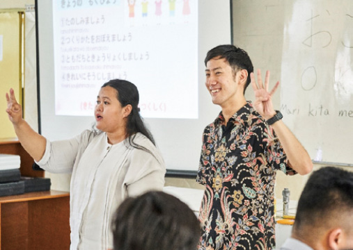 Photo of team teaching with local Japanese-language teachers