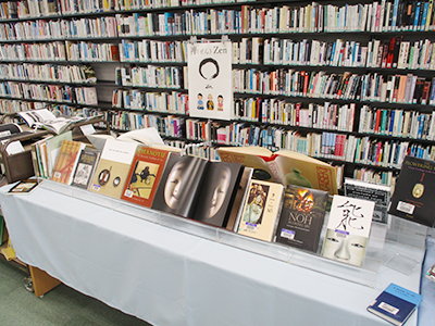 Photo of the many displays of books on “Zen” in the library and handmade popups.
