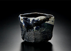 photo of Kichizaemon XV, yakinuki type black Raku tea bowl