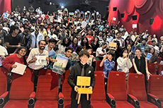 Director Shinkai and audience members pose for a photo at JFF India 2023