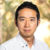 A portrait of Yuji Idomoto