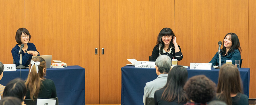 photo of the three speakers on stage after their lecture