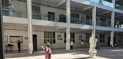 The picture of students on campus, memorizing devotedly