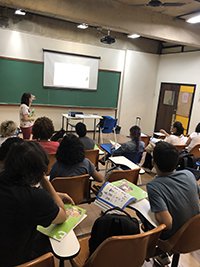 The picture of tutors teaching Japanese-language during a “Languages Without Borders” class.