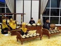 Picture of the first-year students playing traditional Malaysian musical instruments