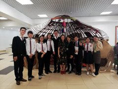 In front of the yurt at the entrance hall of NISIB The leader and members of the Japan Club.