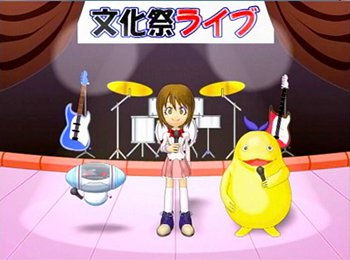 「エリンが挑戦！にほんごできます。」のキャラクター（ホニゴン、エリン、N21-J）がステージでマイクを持っている画像。背景に「文化祭ライブ」という文字と、ギターやドラムがある。