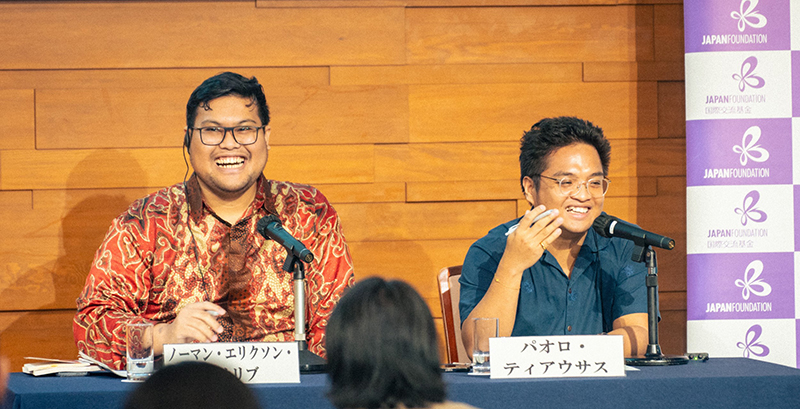 Photo of Norman and Paolo smiling during the talk session
